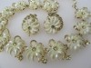 Incredible STAR 1950s plastic and rhinestone flower necklace earring set