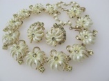 Incredible STAR 1950s plastic and rhinestone flower necklace earring set